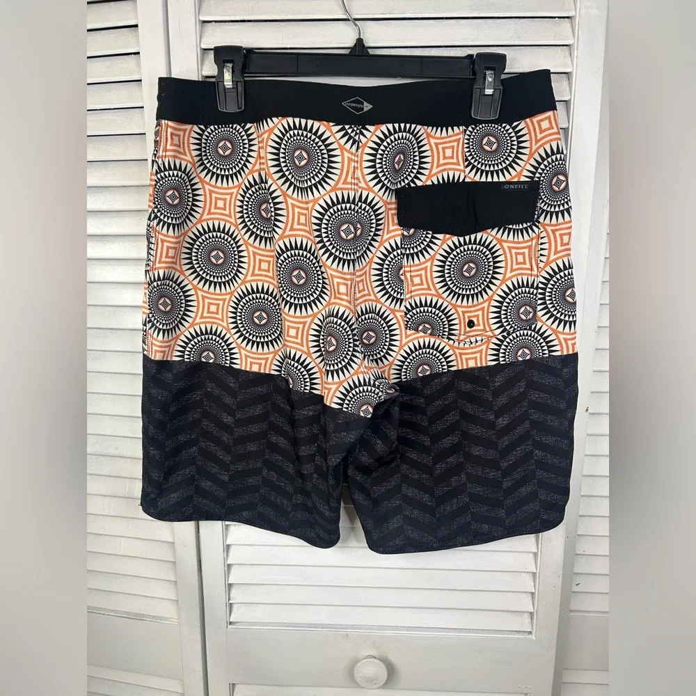 O’Neill Hyperfreak Orange and‎ Black Patterned Board Shorts